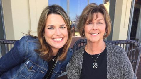 US journalist Savannah Guthrie wears a denim jacked while smiling and posing for a photo with her mother Nancy Guthrie.