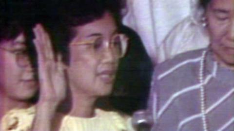 Corazon Aquino being sworn in as president of the Philippines.