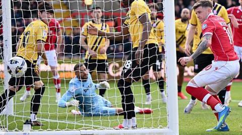 Josh Windass celebrates as the ball hits the back of the Stoke net