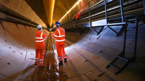 Men working in a tunnel