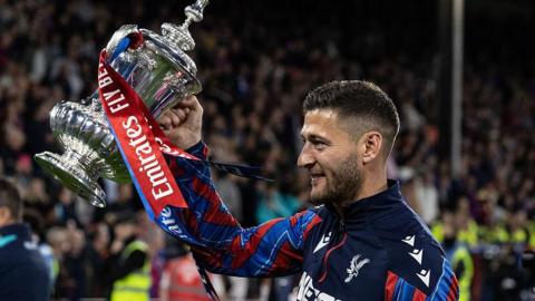 Joel Ward with the FA Cup last season