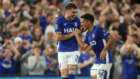 Marcelino Nunez of Ipswich Town celebrates scoring his team’s third goal with teammate Leif Davis