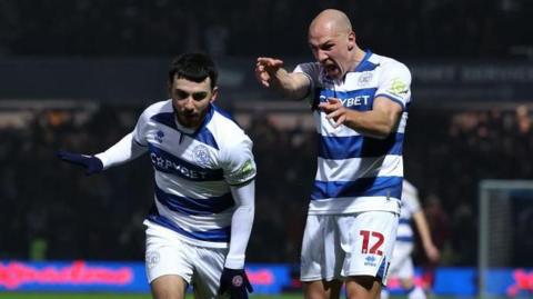 Ilias Chair [left] and Michael Frey [right] celebrate after Chair scores for QPR against Derby County