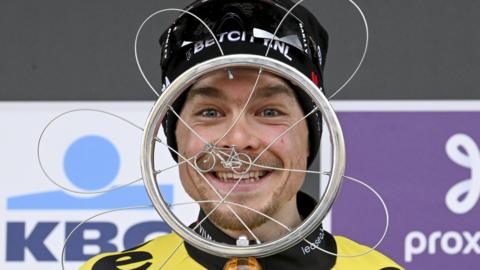 Jan Tratnik celebrates winning the Omloop Het Nieuwsblad one-day race