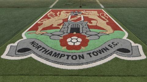 Pitchside logo at Sixfields, home of Northampton Town