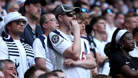Anxious Spurs fans as they tried to get the result they need to stay in the Premier League at home to Everton.