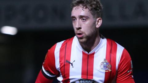 Isaac Marriott in action for Altrincham