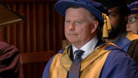 Mark Robins in his Coventry University degree ceremony regalia