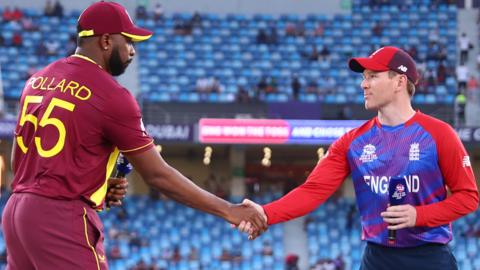 England captain Eoin Morgan shakes hands with West Indies captain Kieron Pollard