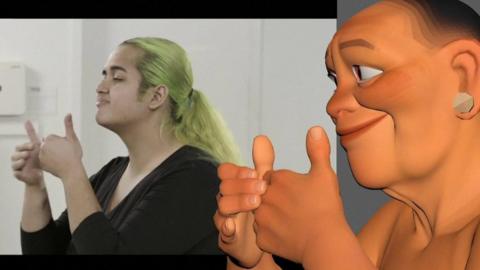 A deaf actor with long bleached hair signs the lyrics to a song, with the Disney animated model replicating her hand movements