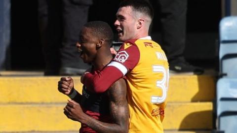 Motherwell players celebrating