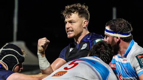 Jack Dempsey celebrates