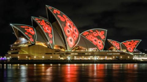 Red poppies projected on the sails of the Sydney Opera House to commemorate Armistice Day