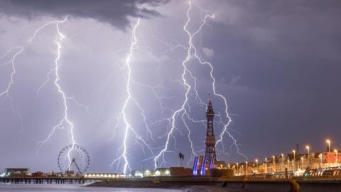 Blackpool with lightening and a big grey cloud