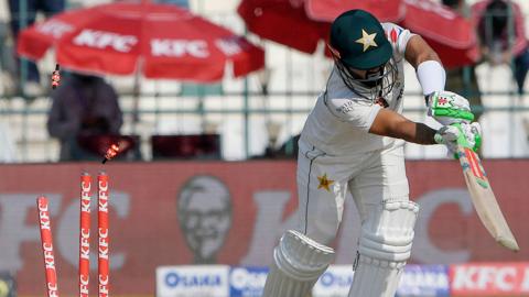 Pakistan's Mohammad Rizwan is clean bowled by England's James Anderson (not pictured) during the third day of the second cricket Test match between Pakistan and England at the Multan Cricket Stadium in Multan on December 11, 2022