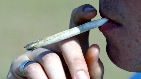 File Picture dated 29/10/2003 of an unknown man smoking a cannabis joint / spliff / bifter.