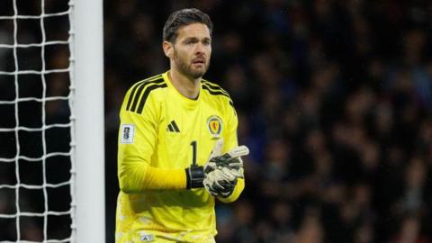 Craig Gordon in action for Scotland against Denmark at Hampden