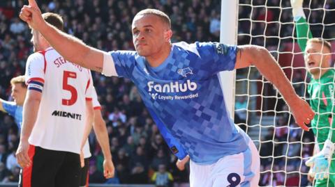 Carlton Morris celebrates scoring
