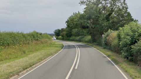 A Google image of of the A447 Hinckley Road at Cadeby, near Market Bosworth. It shows a country road with grass and trees either side