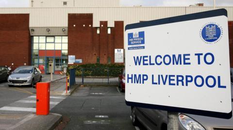 Sign saying Welcome to HMP Liverpool outside the car park in front of the jail