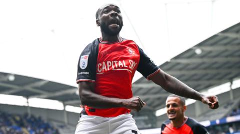Shayden Morris celebrates for Luton against Bolton