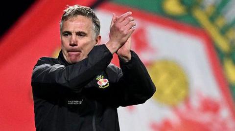 Wrexham manager Phil Parkinson applauds