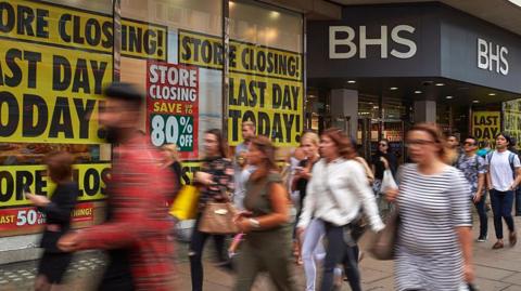 People outside a BHS shop in 2016