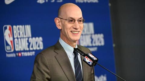 Adam Silver speaking at a news conference