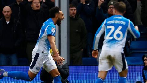 Isaac Olaofe celebrates