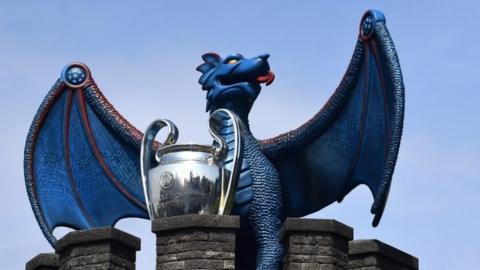 Dragon and trophy