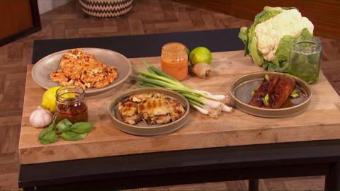 Briony May Williams' marinades displayed on a wooden table.