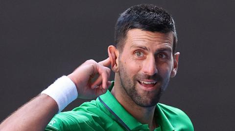 Novak Djokovic jokes with the crowd in a practice session at the 2026 Australian Open