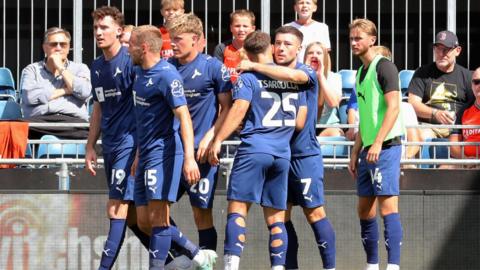 Notts County players celebrate equaliser