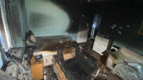 A burnt out room in a flat in Burnham, Essex