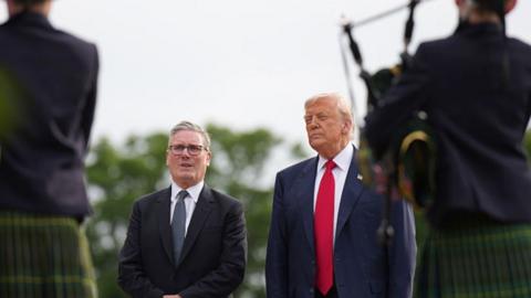 Keir Starmer and Donald Trump watch bagpipe players in Scotland
