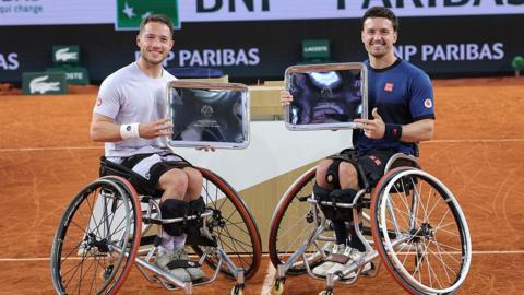 Alfie Hewett and Gordon Reid with the men's wheelchair doubles trophy