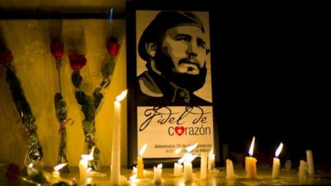 Candles and flowers around a picture of Fidel Castro in Havana. Photo: 26 November 2016