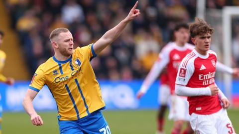 Frazer Blake-Tracy in action for Mansfield against Arsenal