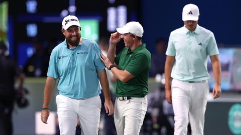 Rory McIlroy laughs with Shane Lowry