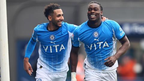 Tanto Olaofe celebrates scoring against Wycombe