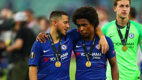 Eden Hazard and Willian talk after picking up Europa League winner medals