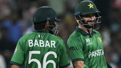 Pakistan's Sahibzada Farhan (right) and Babar Azam run between the wickets during the 2026 ICC Men's T20 Cricket World Cup group stage match between Pakistan and USA