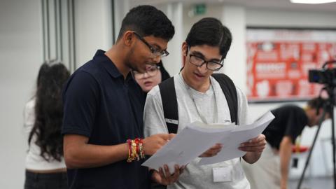 A-Level students receive their results at Ark Academy in London