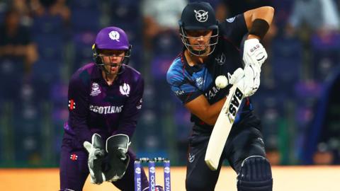 Scotland wicketkeeper Matthew Cross and Namibia batter JJ Smit earlier in 2024