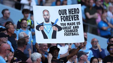 A sign is seen dedicated to Pep Guardiola during the Premier League match between Manchester City and Aston Villa 