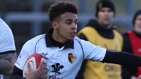 RGC's Caio Parry running with the ball