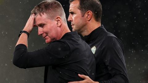 Republic of Ireland assistant coach John O'Shea consoles manager Stephen Kenny after Sunday's defeat by the Netherlands