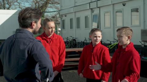 Three school pupils tell Newsround about how temporary classrooms, due to Raac, are affecting their learning. 