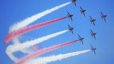 The red arrows in the sky
