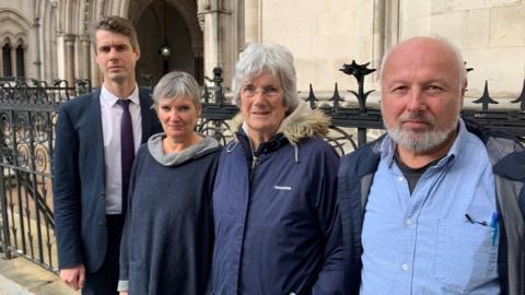 Campaigners Dr Patrick Hart, Ruth Cook, Joy Corrigan, and Stephen Jarvis, outside the Royal Courts of Justice in London